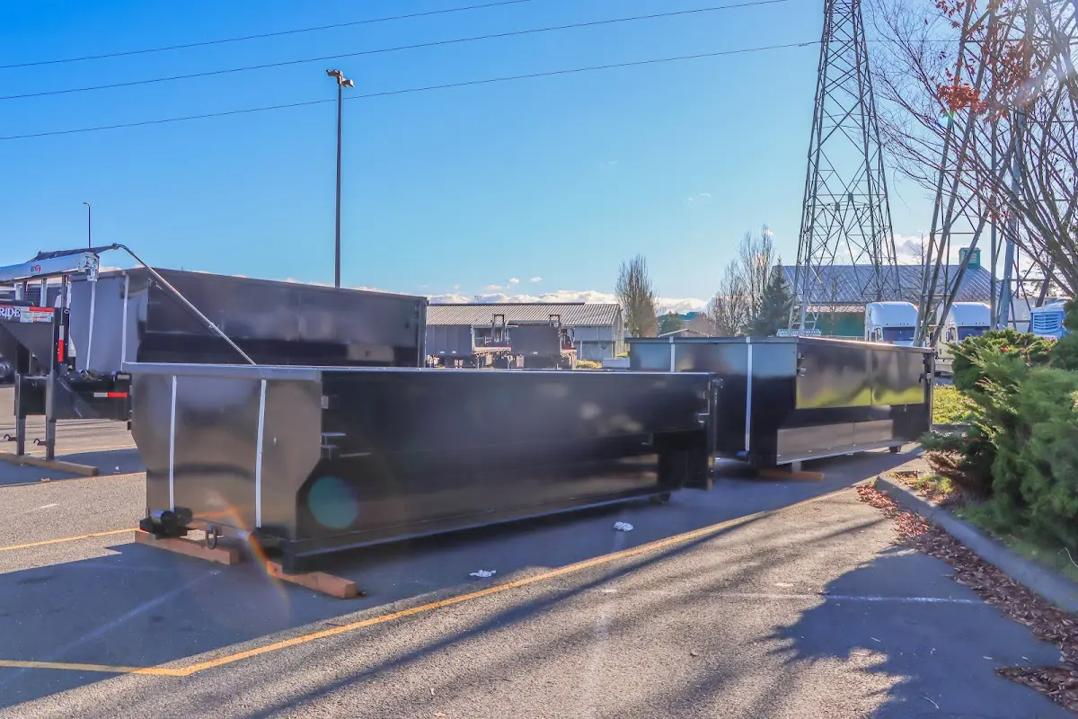Roll-off dumpster ready for waste disposal at job site for Concrete Dumpster Rental in Edwardsville